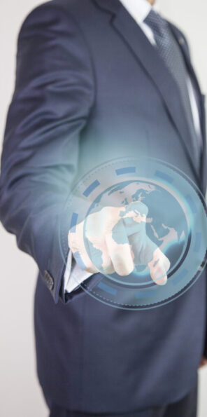 World global business technology concept, businessman holding a glowing global communication, connected
